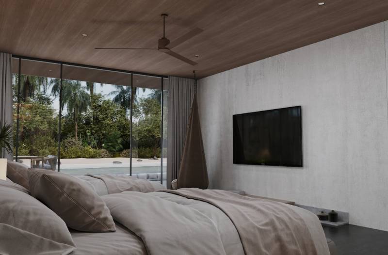 HOTELOVÝ SUITE V LUXUSNOM ZANZIBARSKOM KOMPLEKSE - Spálňa v rodinnom dome s výhľadom na záhradu, bazén a sklenenou stenou.