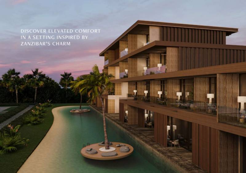 KRÁĽOVSKÝ APARTMÁN V LUXUSNOM ZANZIBARSKOM KOMPLEKSE - Rodinný dom v Nungwi, Zanzibar North, obklopený tropickými palmami a umelou vodnou plochou.