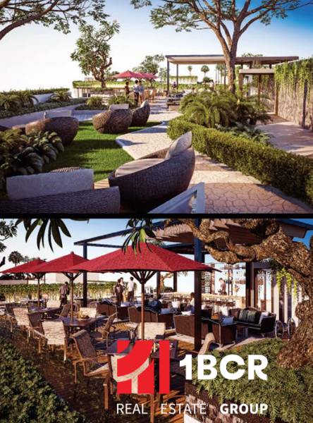 THE RIVIERA BEVERLY HILLS RESIDENCES PATTAYA - Záhrada a vonkajšie sedenie počas bytovej výstavby v Pattaye, obklopené zeleňou.