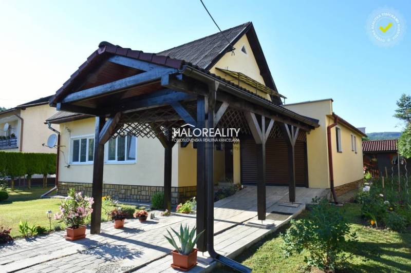Predaj, rodinný dom Župkov - EXKLUZÍVNE HALO REALITY - Rodinný dom v Župkove s pôvabnou záhradou, dreveným prístreškom a stromami v okolí.