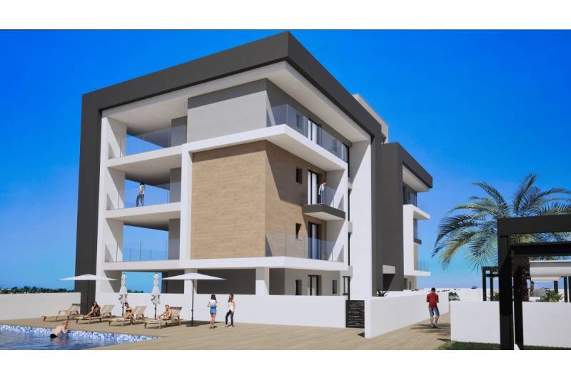 LOS ALCÁZARES -rekreačné apartmány s turistickou licenciou na prenájom - Rekreačný apartmán v Los Alcázares s bazénom a palmami v pozadí.