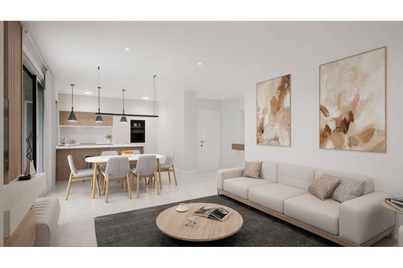 LOS ALCÁZARES -rekreačné apartmány s turistickou licenciou na prenájom - Interiér rekreačného apartmánu zahŕňa kuchyňu, jedálenský stôl, pohovku a dekorácie.