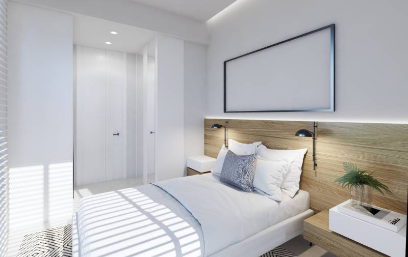 SANTA ROSALIA - Luxusné apartmány s 2 -3 spálňami s výhľadom na jazero - Spálňa v 3-izbovom byte s posteľou, nočnými stolíkmi a vstavanou skriňou.