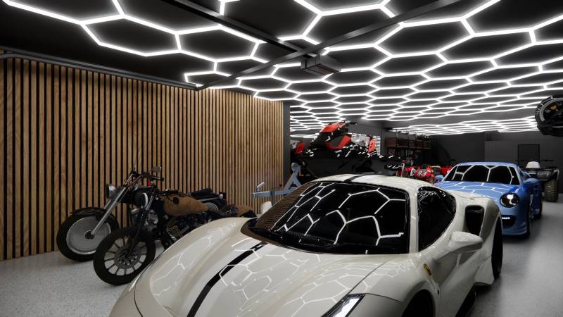 Exkluzívne garáže v projekte PARK3BA, Triblavina, Bratislava - Obchodné priestory s automobilmi, motorkami a unikátnym osvetlením stropu v garáži.