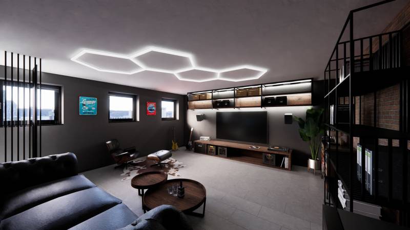 Exkluzívna garáž ( typu B) v projekte PARK3BA, Triblavina, Bratislava - Interiér obchodných priestorov so sedením, televízorom a dekoračnými prvkami.