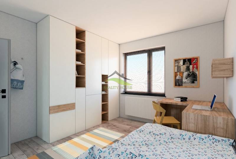 Murovaná Novostavba - Rodinný dom s pekný pozemkom 800 m2 - Detská izba v rodinnom dome s úložnými skrinkami a pracovným stolom.