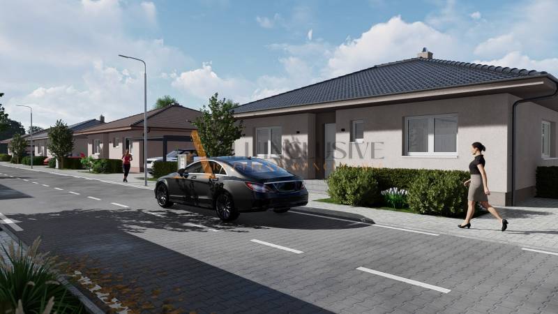 POSLEDNÉ 2 NOVOSTAVBY | PRÁZNOVCE - Ulica PRÁZNOVCE v Topoľčanoch s radom rodinných domov a prechádzajúcimi autami.
