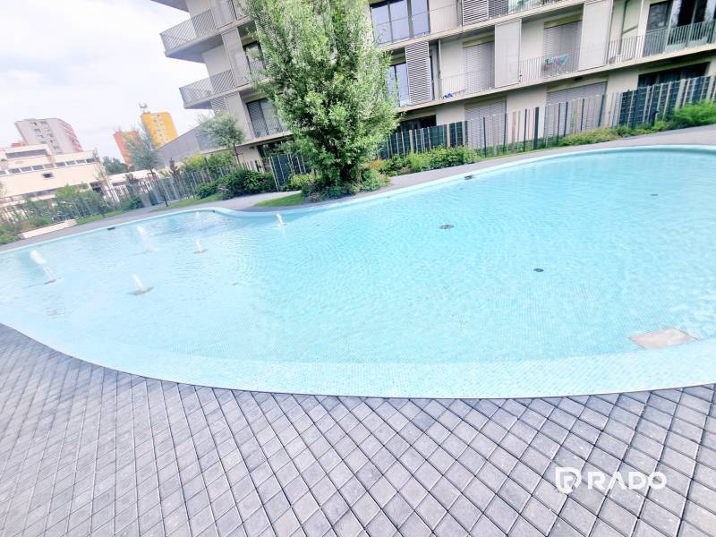 | EXKLUZÍVNE! | Krásny NOVÝ 2-izbový byt | 48m² | Čerešne - Exteriér v Bratislave - Dúbravke, Polianky s bazénom pri bytovom dome, okolitá zeleň.