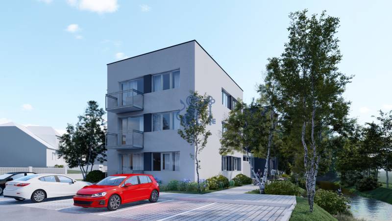 Pozemok s rozostavanou stavbou pre 12 bytov pri Senici - Bytovka obklopená zeleňou a parkoviskom, ideálne miesto pre bývanie a relax.