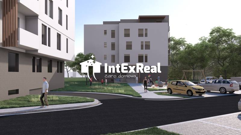 NOVOSTAVBA -2 izbový byt s komorou, na predaj  Galanta - Budova v Galante, okolie s ľuďmi, autami a ihriskom, ponuka 2-izbového bytu.