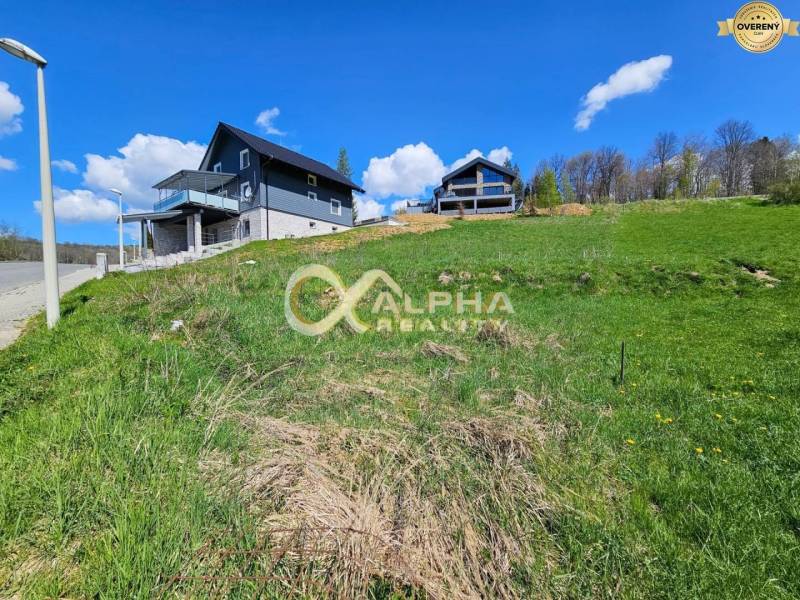 Stavebný pozemok lokalita Slnečná úboč, Levočská Dolina, okres Levoča - Krásne pozemky na bývanie v Levoči s výhľadom na rodinné domy.