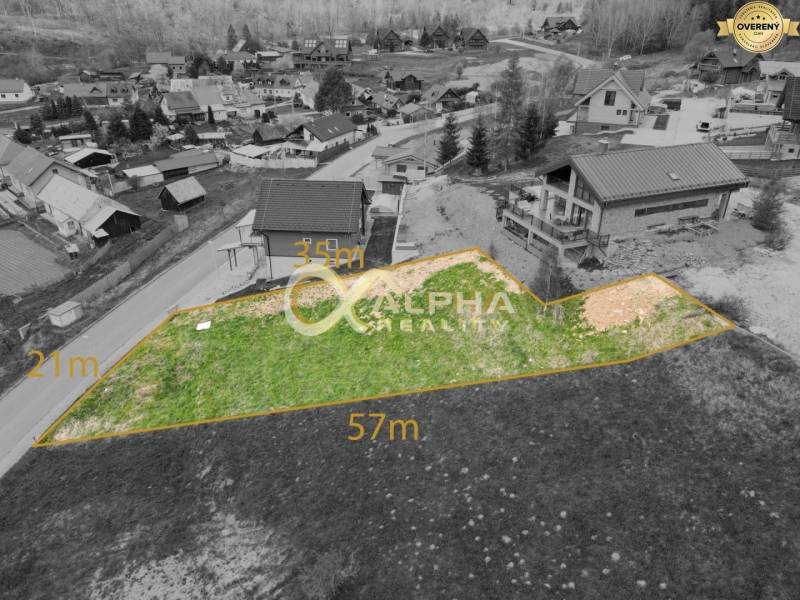 Stavebný pozemok lokalita Slnečná úboč, Levočská Dolina, okres Levoča - Pozemky na bývanie v Levoči, vyznačená parcela obklopená zástavbou a prírodou.