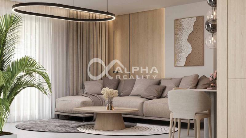 Exkluzívne novostavba rodinný dom - dvojdom, Spišské Podhradie - Obývačka s béžovou sedačkou, dekoratívnymi prvkami a stropným svietidlom v rodinnom dome.