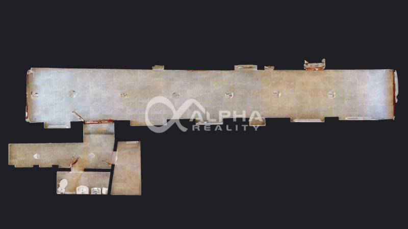 Polyfunkčný priestor na predaj, 66,5m2+pivnica 38m2, Zimná ul., Spišsk - Pôdorys obchodných priestorov s dlažbou zobrazený na tmavom pozadí.