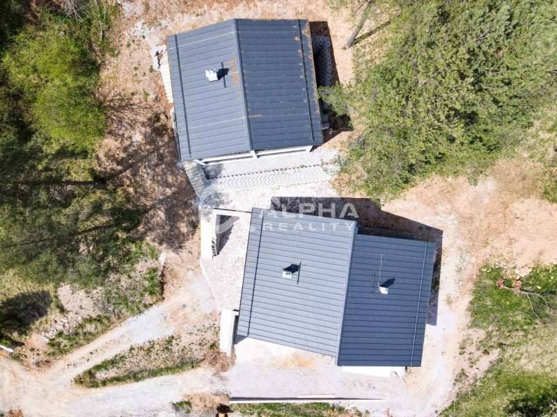 2i alebo 3i byt, Poráč, okres Spišská Nová Ves - Letecký pohľad na rekreačné apartmány v Poráči obklopené zeleňou a stromami.