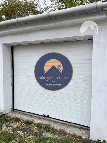 Vám ponúka na PREDAJ zrekonštruovanú garáž v Du - Biela brána garáže na Nevädzovej ulici v Dunajskej Strede s logom Reality KompleX.