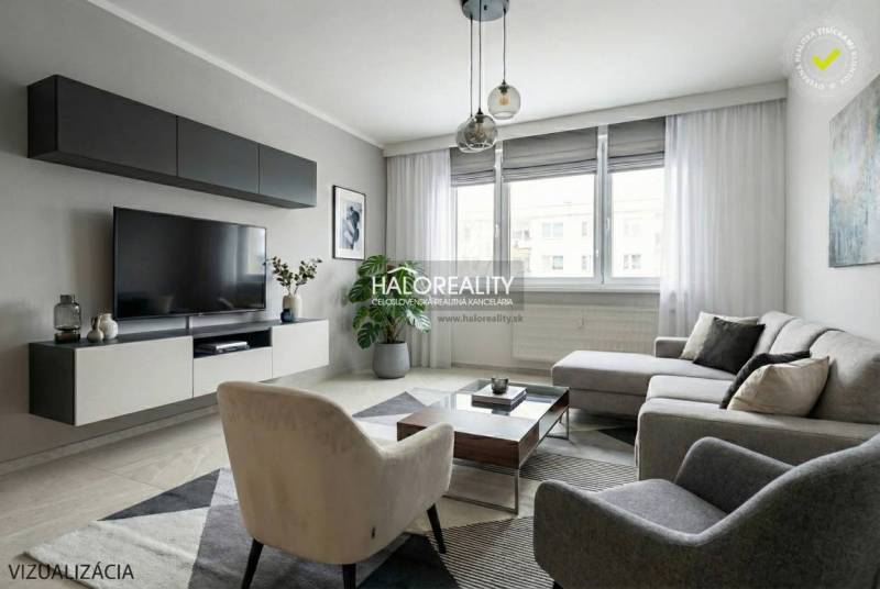 Predaj, trojizbový byt Považská Bystrica, Rozkvet - ... - Obývačka v 3-izbovom byte s veľkou pohovkou, TV, koberec, podlaha s dreveným dekorom.