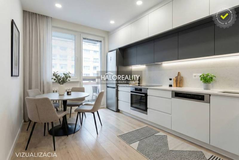 Predaj, trojizbový byt Považská Bystrica, Rozkvet - ... - Jedálenský kút s okrúhlym stolom a kuchyňa s linkou v 3-izbovom byte.