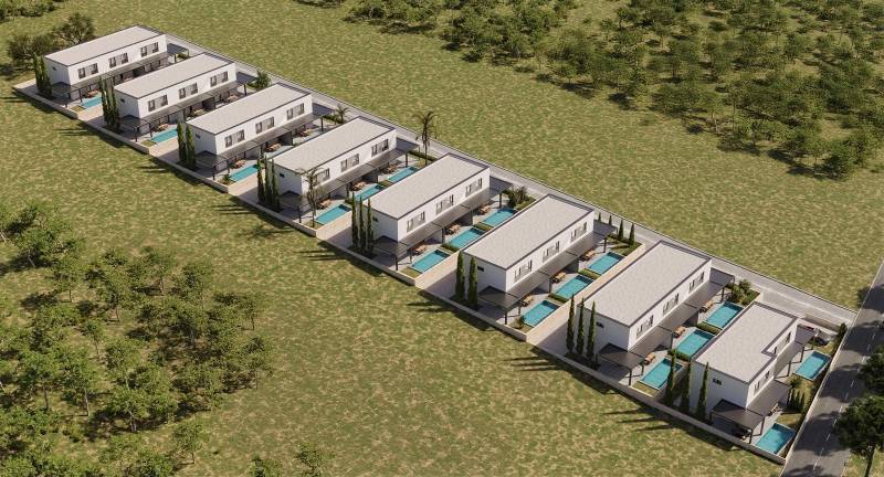 CHORVÁTSKO - Nový apartmánový komplex - MANDRE, ostrov PAG - Riadok moderných prázdninových domov s bazénmi v Mandre medzi zeleňou a stromami.