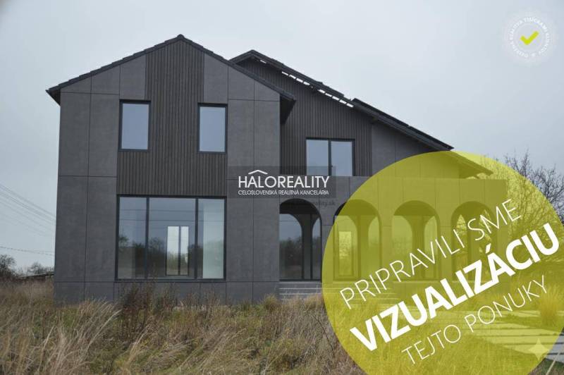 Predaj, rodinný dom Dolný Pial - VO VÝSTAVBE - Rodinný dom v Dolnom Piale s tmavosivou fasádou a rozľahlými oknami.