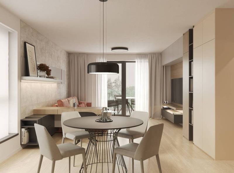 Prémiové byty s vysokým investičným potenciálom - Obývacia izba s jedálenským stolom, podlahou s dreveným dekorom a balkónom.