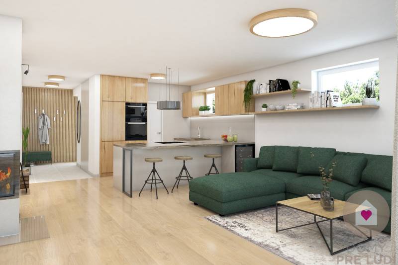 VEĽKORYSO RIEŠENÝ 4 izbový RD-128 m2 S TEP. ČERPADLOM, POZEMOK 405 m2 - Interiér rodinného domu s kuchyňou, zelenou pohovkou a podlahou s dreveným dekorom.