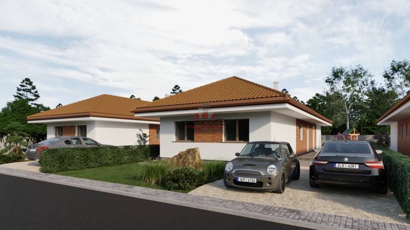 3 x 4iz. Novostavba Veselé pri Piešťanoch - Rodinný dom na ulici Veselé v meste Veselé s dvoma automobilmi na príjazdovej ceste.