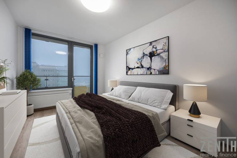 PREDAJ 2-IZBOVÉHO BYTU – NOVOSTAVBA JARABINKY, RUŽINOV - Spálňa v 2-izbovom byte s pohodlnou posteľou, obrazom a lampou na nočnom stolíku.