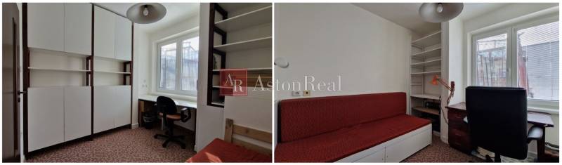 AstonReal: EXKLUZÍVNE predaj rodinný dom Spišská Nová Ves - Ferčekovce - V rodinnom dome sú biele skrinky, pracovný stôl a červená sedačka.