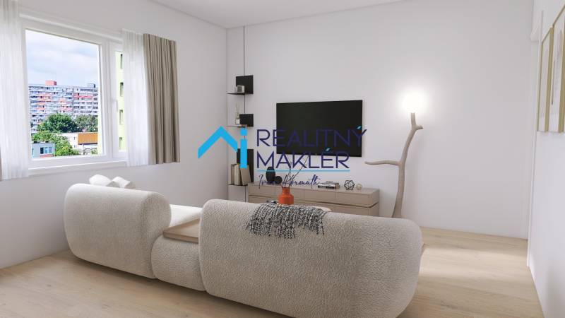 PREDANÉ - 4 izbový byt s loggiou v Petržalke - Obývacia izba v 3-izbovom byte s pohodlnou pohovkou a televízorom na stene.