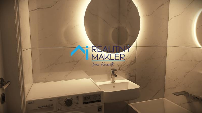 PREDANÉ - 4 izbový byt s loggiou v Petržalke - Kúpeľňa v 3-izbovom byte so svetlými obkladmi a práčkou.