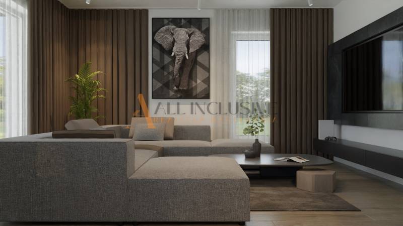 POSLEDNÁ NOVOSTAVBA - HOLODOM | PRÁZNOVCE - Obývacia izba s šedou sedačkou, obrazom slona a televízorom v rodinnom dome.