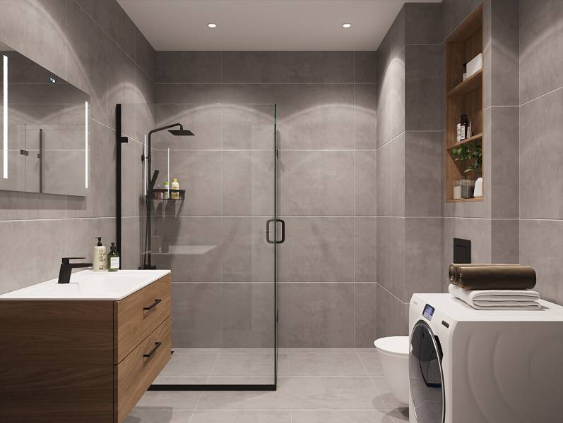 Pripravujeme: Moderná novostavba bytového domu, Byty Maty - Kúpeľňa so sprchovacím kútom, umývadlom, práčkou a poličkami v 1-izbovom byte.