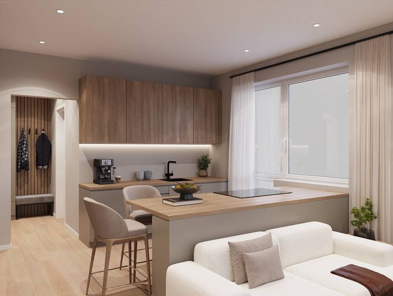 Pripravujeme: Moderná novostavba bytového domu, Byty Maty - Interiér 1-izbového bytu s podlahou s dreveným dekorom a kuchynským kútom.