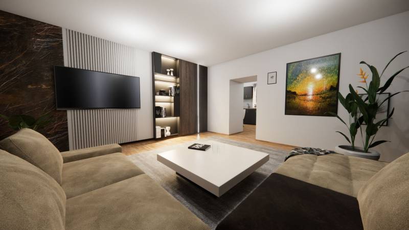 NA PREDAJ 3-IZBOVÝ RD (ČASŤ DVOJDOMU), ZEMIANSKA OLČA - Obývacia izba v rodinnom dome s pohovkou, stolíkom, televízorom a malbou na stene.