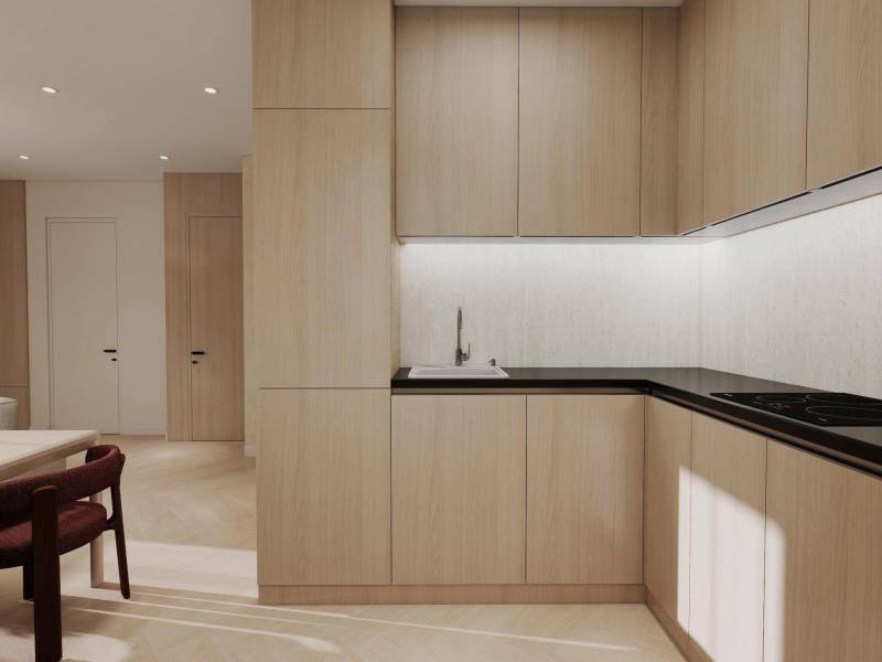 NA PREDAJ 4-IZBOVÉ RD – REZIDENČNÝ PROJEKT, GABČÍKOVO - Kuchyňa s podlahou s dreveným dekorom v rodinnom dome, svetlé skrinky, čierna pracovná doska.