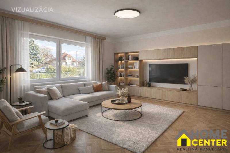 NA PREDAJ 5 izbový rodinný dom s veľkou záhradou v obci Iža - Obývačka v rodinnom dome s pohodlnou sedacou súpravou a podlahou s dreveným dekorom.