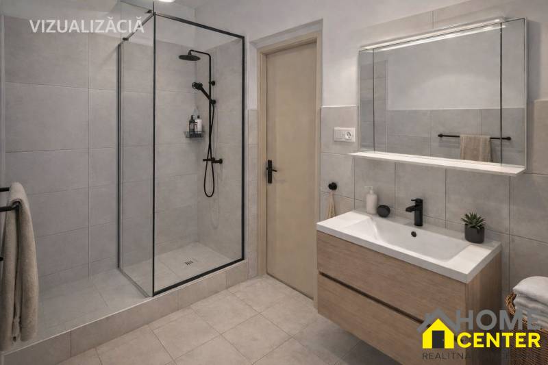 NA PREDAJ 5 izbový rodinný dom s veľkou záhradou v obci Iža - Kúpeľňa v rodinnom dome s moderným sprchovým kútom a umývadlom s úložným priestorom.