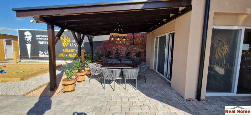 Prenájom kaviarne  v obci Nová Dedinka pri Senci - Gastro priestory v Novej Dedinke s vonkajším posedením a tehlovým múrom.