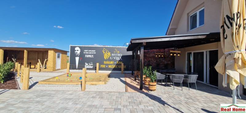 Prenájom kaviarne  v obci Nová Dedinka pri Senci - Gastro priestory v Novej Dedinke s terasou, pieskoviskom a tematickým výhľadom.