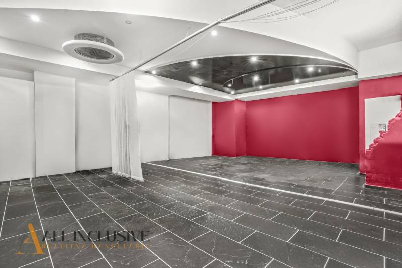 NA PREDAJ OBCH.PRIESTOR, BRATISLAVA–VRAKUŇA (PENTAGON) - Čierno-biely interiér obchodného priestoru s červenými stenami a dlažbou.