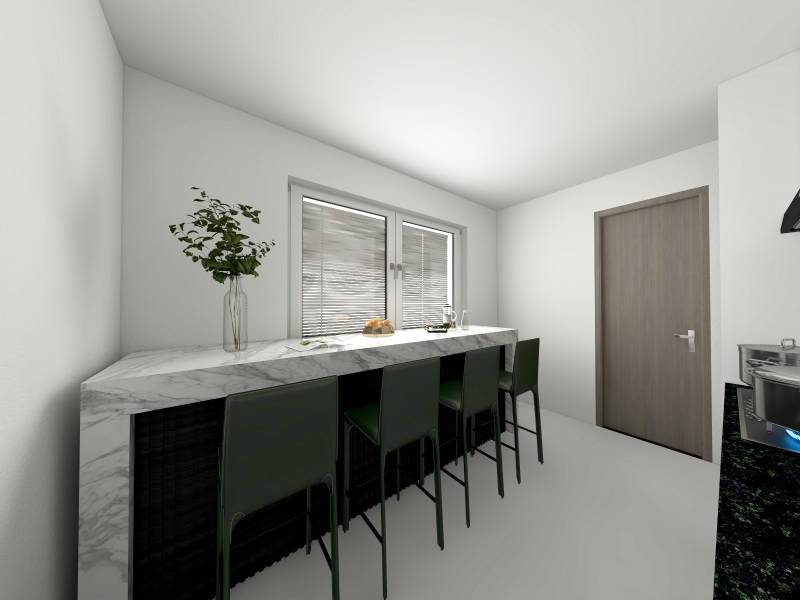 I Predaj 3- izbového bytu v Dúbravke - Kuchyňa v 3-izbovom byte s mramorovým pultom a vysokými stoličkami.