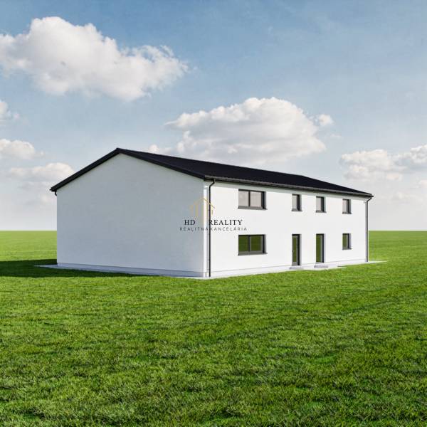 Predaj, výrobný a veľkoobchodný areál v okrese Veľký Krtíš - Výrobné priestory v meste Veľký Krtíš na zelenej lúke s modrou oblohou.