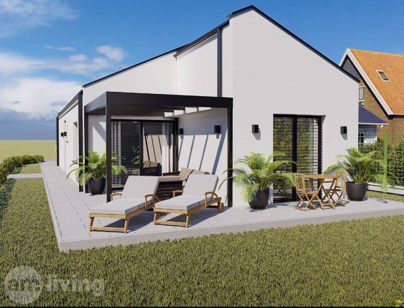 NOVINKA - 2x Novostavba RODINNÝCH DOMOV - Borčice  - Rodinný dom v Borčiciach s terasou, ležadlami a záhradným nábytkom obklopený zeleným trávnikom.