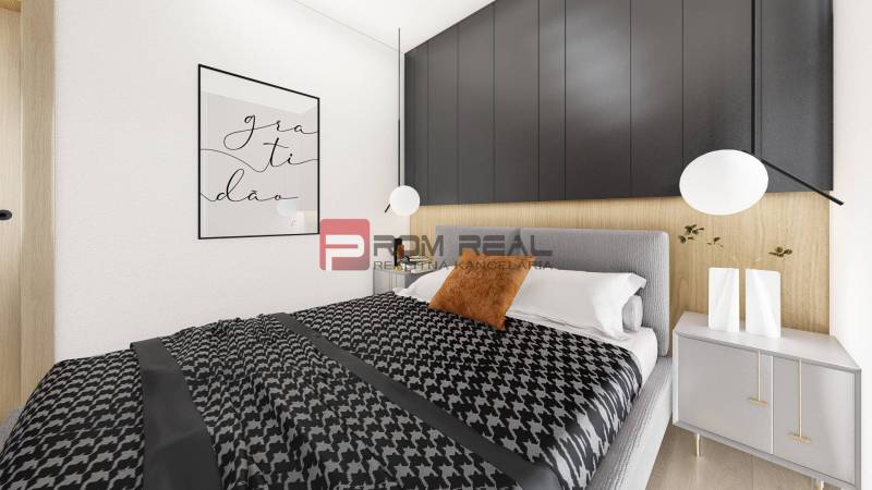 Predaj 3-izbový byt od 184 999 € v projekte Rezidencia Potôčik - Spálňa v 2-izbovom byte s čiernobielou posteľnou bielizňou a dekoráciami.