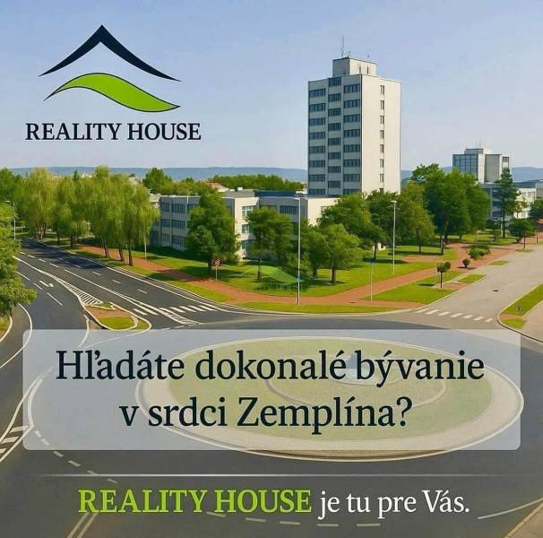 Kvalitná Murovaná NOVOSTAVBA blízko mesta - v Zalužiciach  - Kruhový objazd s budovami a parkovou zeleňou v meste Hnojné, kategória Pozemky - bývanie.