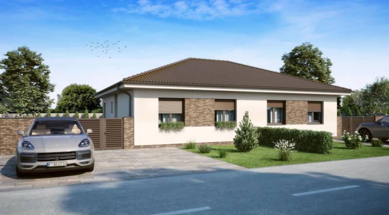 Na predaj 3-izb. RD - časť dvojdomu, Veľké Dvorníky - Rodinný dom vo Veľkých Dvorníkoch s tehlovým obkladom a autom v garáži.