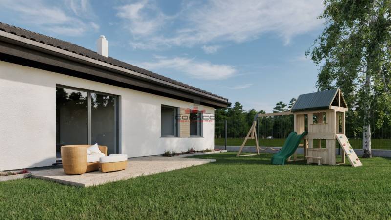 4iz RD (v štandarde + zámková dlažba, terasa) Drahovce - Exteriér Rodinného domu na Kostolnej ulici v Drahovciach s terasou a detským ihriskom.