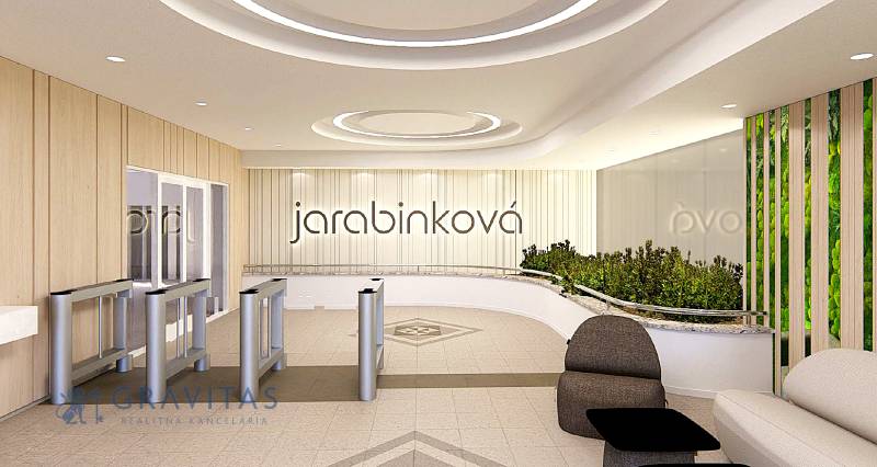 Kancelárie na prenájom: od 20m2 | Jarabinková ulica - Recepcia v kanceláriách s turniketmi, sedacími súpravami a dreveným dekorom na stene.