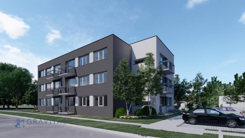 Pozemok s rozostavanou stavbou pre 12 bytov, Senica - Trojposchodová budova s balkónmi, parkoviskom a zeleňou v mestskej časti.